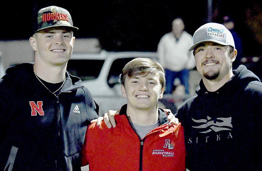 On hand for Ainsworth’s win over Creighton were three former teammates from Ainsworth’s first two District Championships, (left to right) Carter Nelson, Traegan McNally and Trey Appelt.