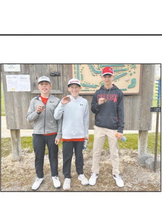 Medalists at the North Central Invite were (left to right): Nathan Fernau (first), Callen Pierce (seventh), and Drew Palmer (eighth).