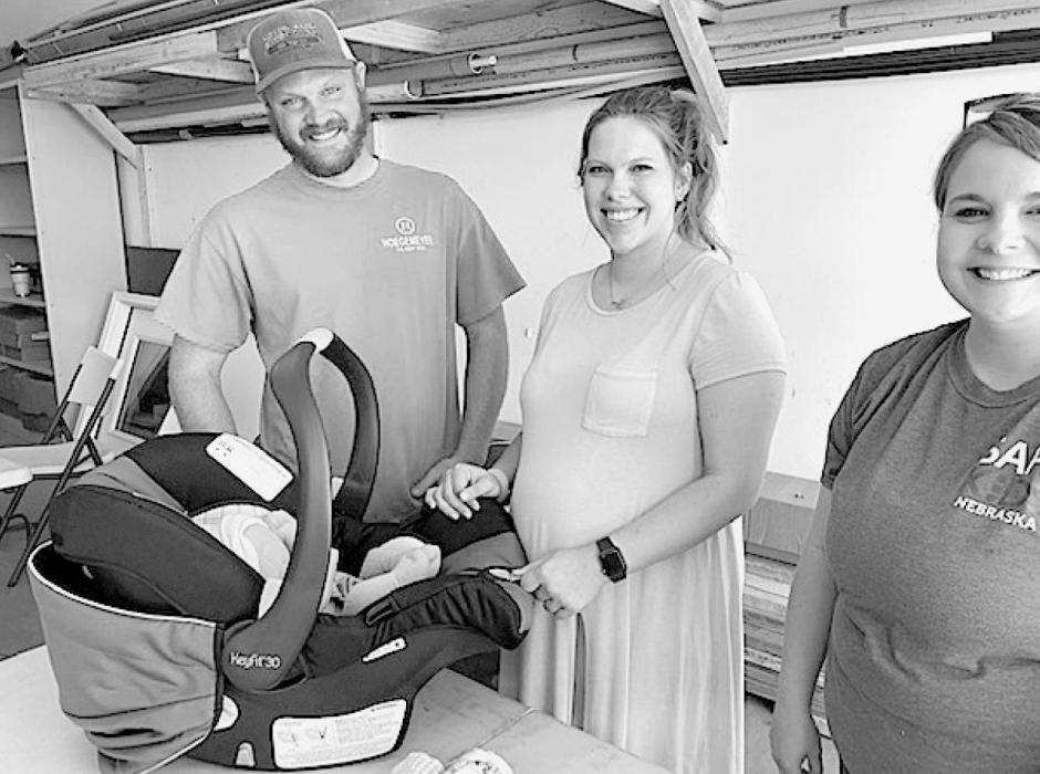 Liz Wright and Drake Fiala got a car seat check and installation information from Anna Novak, FNP and Car Seat technician before the birth of their son.