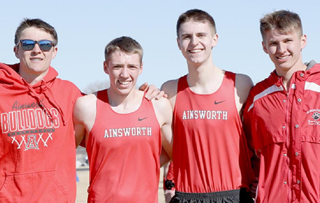 The Ainsworth boys team of (left to right) Trey Appelt, Ty Schlueter, Ben Flynn and Thomas Ortner took first place in the Boys Distance Medley.
