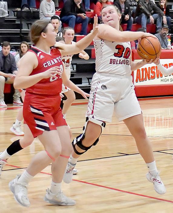 Jocelyn Good pulls down a rebound against the Ord Lady Chanticleers. Good had 13 points and seven rebounds against the Lady Chants.