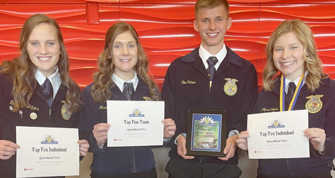 The Ag Sales team finished in third place; team members were (Left to Right): Libby Wilkins (ninth place individual), Maren Arens (red ribbon), Tom Ortner and Alyssa Erthum (second place overall individual).