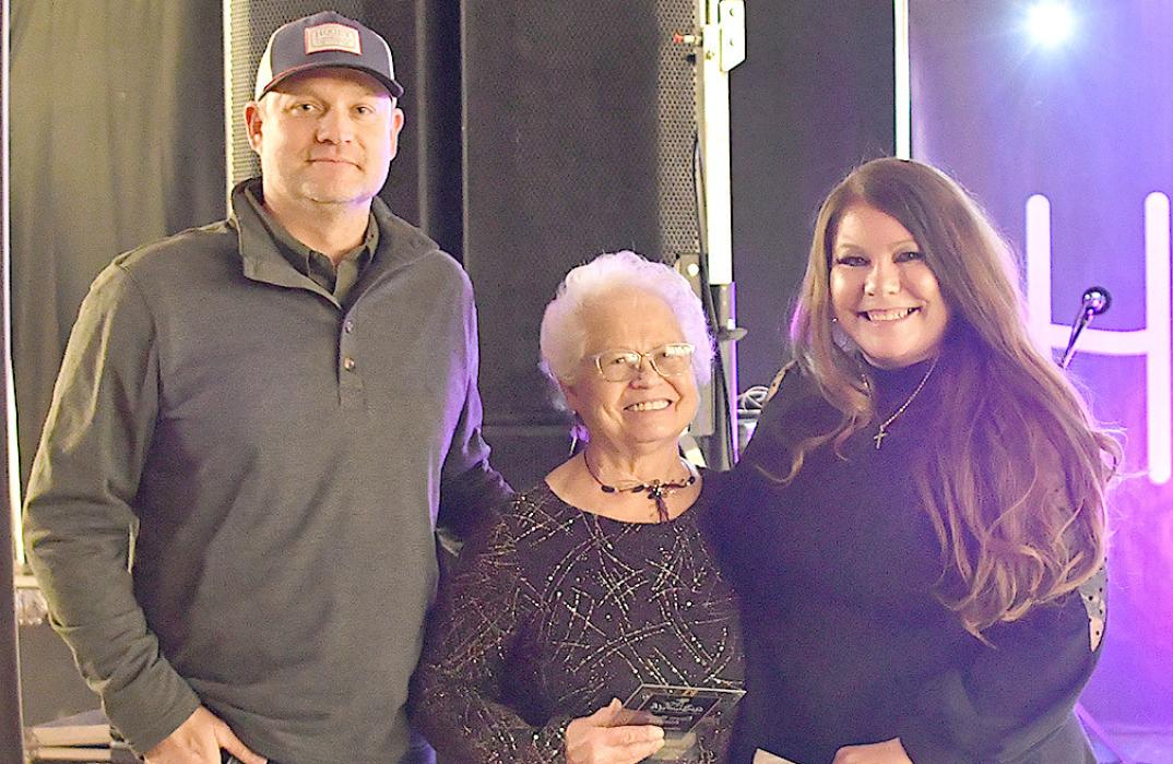 The Chamber Give Back Award honors an outstanding business, organization, or community member who consistently goes above and beyond to bring special services, opportunities, and events to the area that enrich our culture and bring joy to community members. Tanner Jones and Misty Rowley present the award to Bonnie Finley.