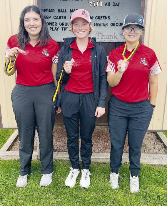 Bulldogs in the top five were (left - right): Braylin Rudnick, first place; Kenley Welke, third place; and Maddie Palmer, fourth place.