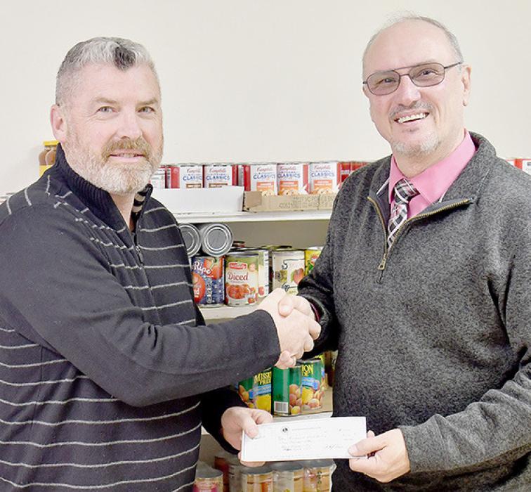 Lions Club Donates to Ainsworth Food Pantry