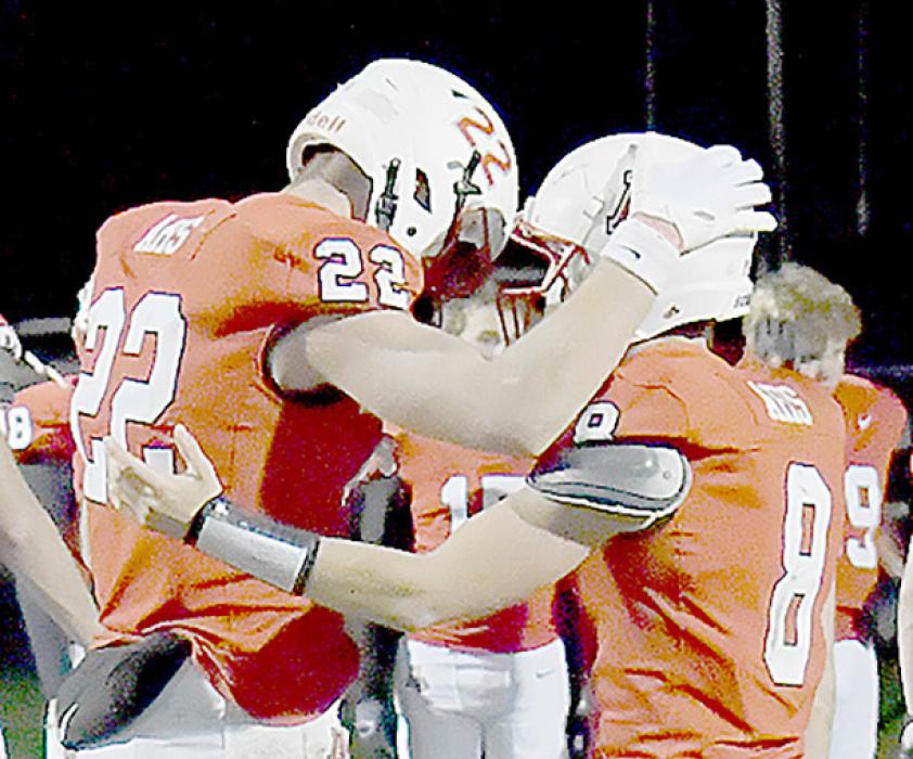 Seniors Carter Nelson and Traegan McNally console each other after the loss to Howells-Dodge in the D2 Second Round Playoff. Nelson and McNally have been two of the mainstays of the Bulldogs for the last four years.