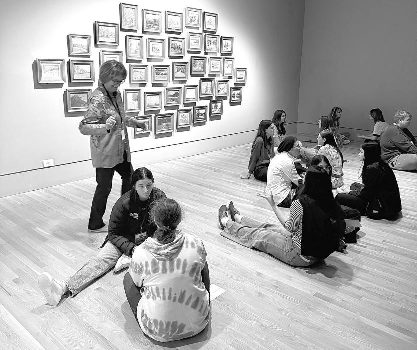 Renata Arizmendiz and Annick Altamirano discuss the En Plein Air Painting exhibit.