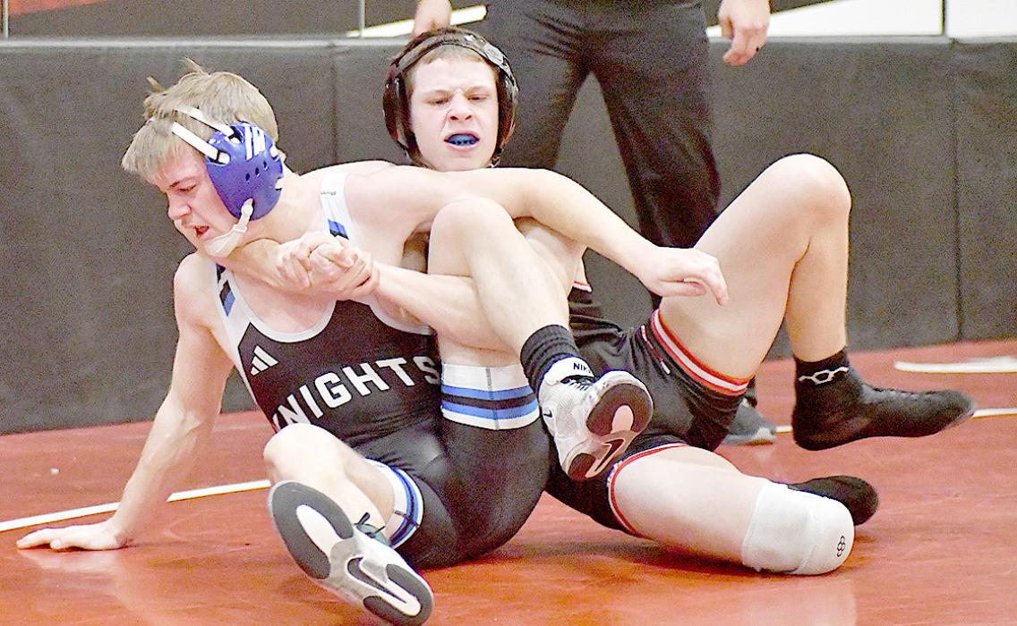 Dylan Titus, 126 lb. weight class, defeated Jaxon Cozad of North Central by a fall in 2:15.