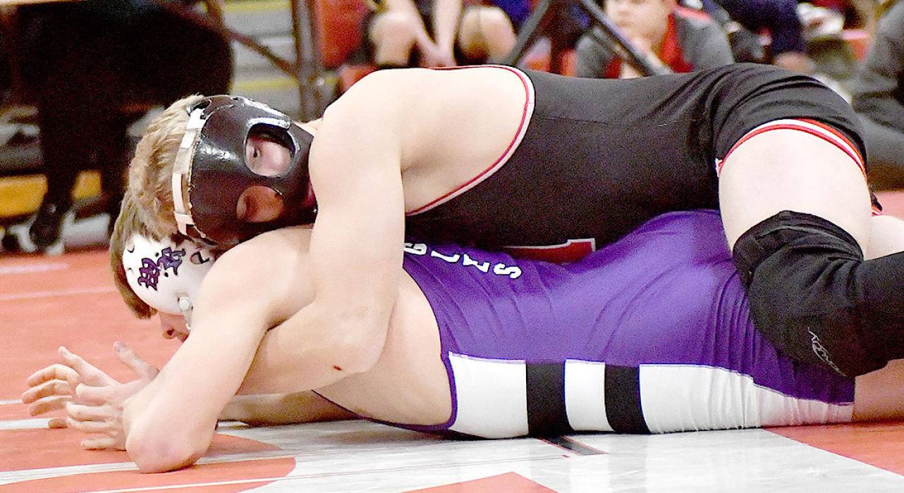 Wrestling in the 150 lb. weight class Mason Painter Central in the 113 lb. weight class. placed third. Photos by Devin Painter