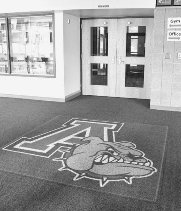 Community Center Gym Floor in Partial Removal Stage; Maple Flooring Being Laid at School