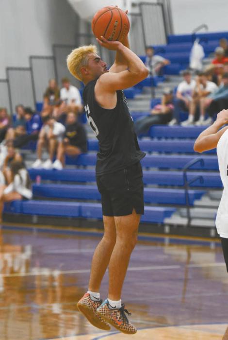 Chris Fernandez pulls up for a jump shot during the game held at O’Neill High School on Friday, May 29. The teams consisted of athletes from North Central Nebraska high schools. The White team beat the Black team in the final quarter, after trading leads several times through the four 10 minute quarters.