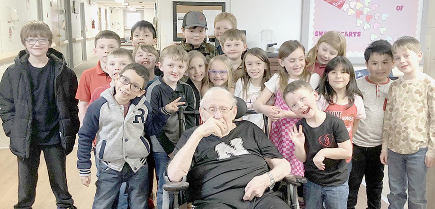 The McAndrew Elementary 2nd Grade Class visited the Sandhills Care Center on Valentine’s Day, February 14th. The class poses with resident Dale Kirkpatrick.