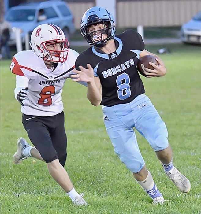 Traegan McNally tackles Trevor Thomson of Summerland. Thomson gained 254 yards on the ground against the Dawgs.