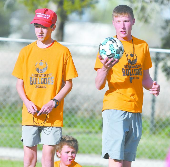 AHS freshmen Ryan Kerrigan (left) and Jacob Ortner (right) coached the Orange team this year.