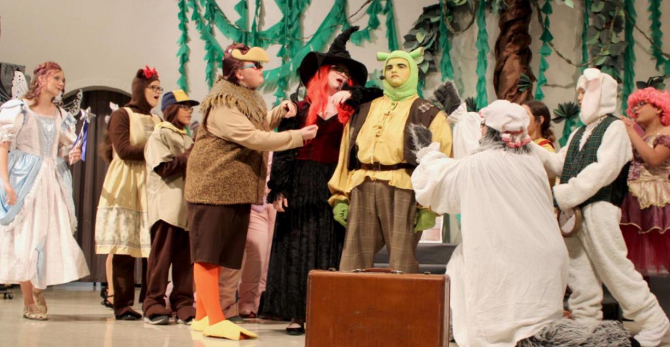 The Fairytale Creatures and Shrek the Ogre perform a song together in Act I.