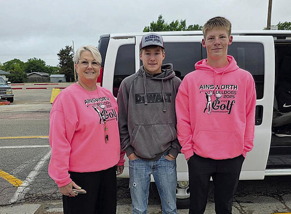 The Ainsworth Boys Golf Team was coached by Julie Micheel this year. This season was Micheel’s final season as head coach. Pictured above is Micheel with state qualifiers Jhett Hollenbeck and Jaxon Rucker.