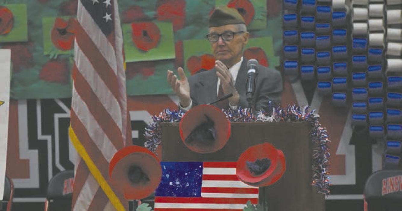 Jerry Ehlers led the Veterans Day program this year. He wears his grandfather’s cover from his time in World War I.