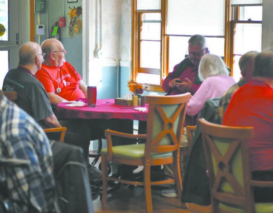 Residents at the Sandhills Care Center ate Thanksgiving food with friends and family during the family thanksgiving meal.