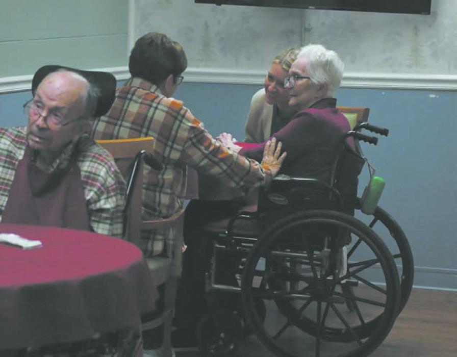 Visitors from the public gathered with their family and friends at the care center to enjoy good food and conversation.