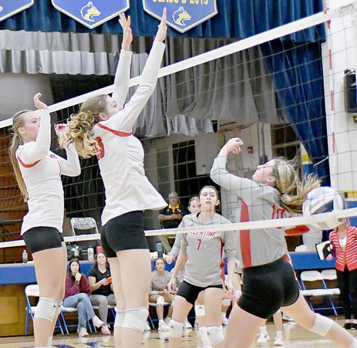 Kaityln Sease blocks the ball back against Valentine in Subdistrict action.