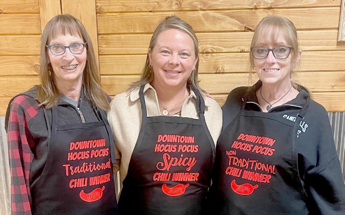 Winners were (left to right): Marsha Fuchs - Traditional, Mashell Arens - Spicy and Cheri Coutts - Nontraditional. Each of the aprons were made by Palmer Embroidery.
