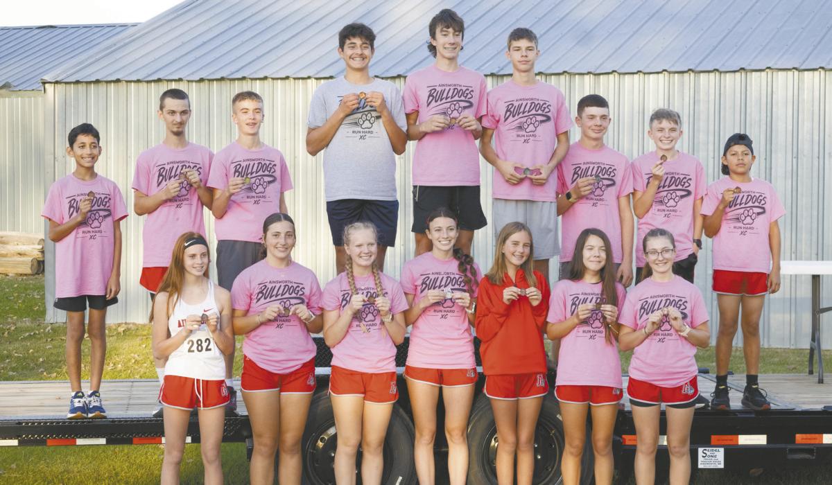 Middle and high school cross country runners who earned medals at the NVC Meet include (back row): Adiel Macias-Villalobos, Jon Strand, Blake Hansmeyer, Cesar Guichard-Mingo, Ryan Kerrigan, Holden Beel, Mason Winters, Tygan Sisson and Angel Solache-Sanchez. Front row: Monroe Buckles, Addilyn Doke, Kiley Orton, Reagan Moody, Emilyn Goochey, Stella Lentz and Kimberlyn Doke.
