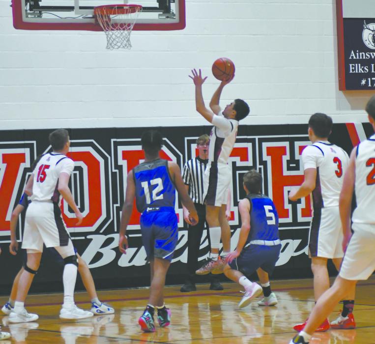 Senior Chris Fernandez goes up for a layup during the team’s game against Hyannis. Fernandez had 22 points during the game.