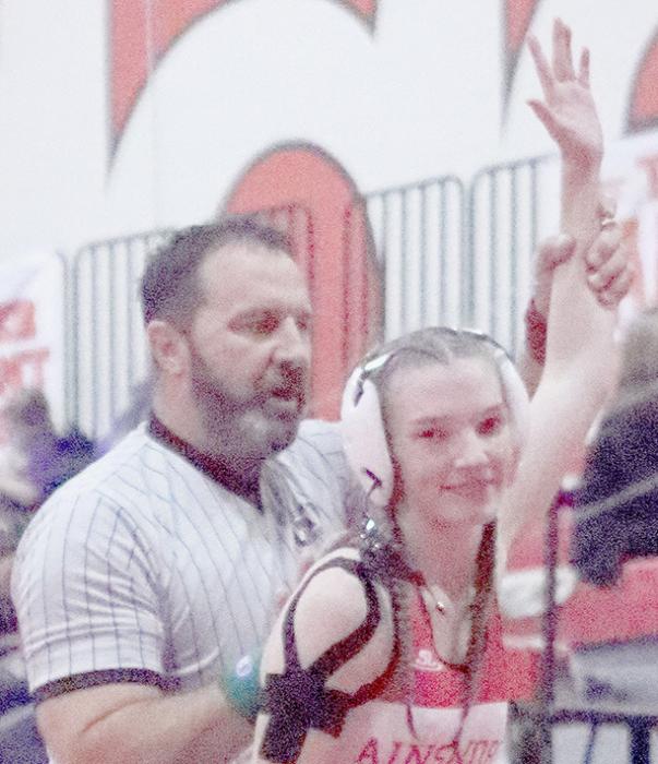 Jolyn Pozehl won all four of her wrestling matches by pins at the Valentine Invitational Wrestling Tournament to take first place in the 115 lb. weight class.