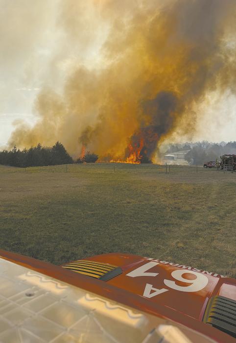 A prescribed burn broke containment Monday afternoon west of Johnstown, prompting the response of numerous volunteer fire departments. Photo Courtesy of Ann Fiala
