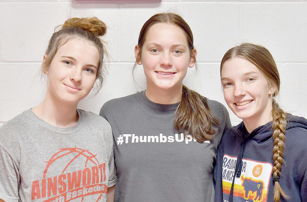 The Ainsworth Girls Wrestling Team starts the 2023-24 season with a Dual at Burwell on November 30th. Returning letter winners for the AHS Girls Wrestling Team are (Left to Right) Zaily Daniels, Megan Jones and Jolyn Pozehl.