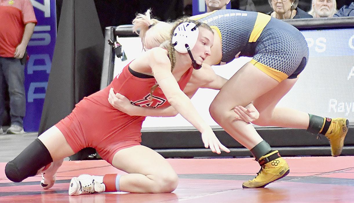 In the 1st Place Match, televised on Saturday afternoon, Pozehl lost by a fall in 3:48 to Sophia Shultz of Raymond Central giving her the silver medal. Shultz, a senior at Raymond Central, ended her season undefeated with a 35-0 record and Pozehl, a junior at Ainsworth, finished with a 37-3 record. Photos by Jessica Pozehl