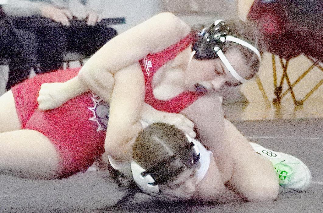 Paisley Hoffman qualified for her first NSAA State Wrestling Tournament in the 105 lb. weight class. Photos by Jessica Pozehl