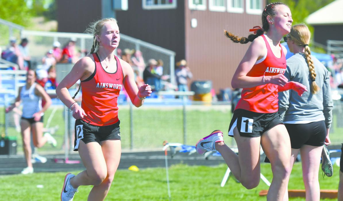 Kiley Orton (left) and Reagan Moody (right) finished top two in both the 1600 and 3200 meter runs, qualifying them in both events for the state meet.