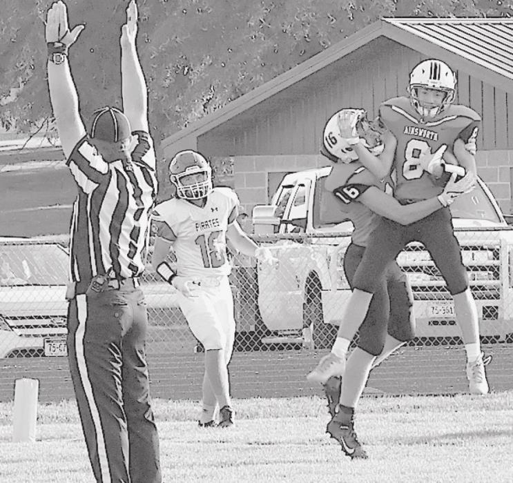 Traegan McNally is joined in the endzone by Cash Reynolds to celebrate Ainsworth’s first touchdown of the 2021 football season. McNally scored on the first play from scrimmage with a 55-yard run.