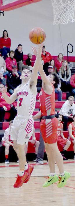 Caleb Allen scores two of Ainsworth’s 68 points in their game against the Valentine Badgers.