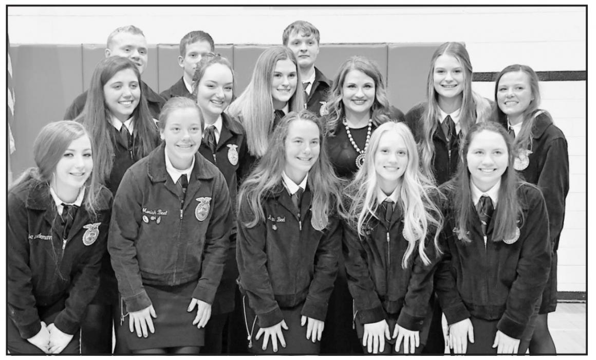 FFA Advisor Miss Emily Whipple is pictured surrounded by this year’s 13 Senior FFA members (Front Row – Left to Right): Valarie Morris, Moriah Beel, Katrina Beel, Cailin Orton, Ellie Welke; (Middle Row – Left to Right): Josie Ganser, Shaley Starkey, Elizabeth Smith, Miss Whipple, Adriana Hood, CeeAnna Beel; (Back Row – Left to Right): Logan Hafer, Caden Swanson, and Rylan Hobbs.