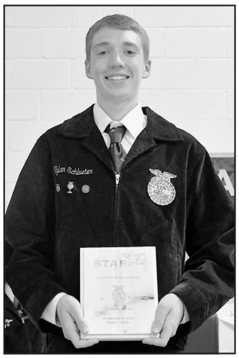 Ty Schlueter received the FFA Chapter Star Award as the Star Farmer. His Supervised Agricultural Experience is owning and managing a small cattle herd.