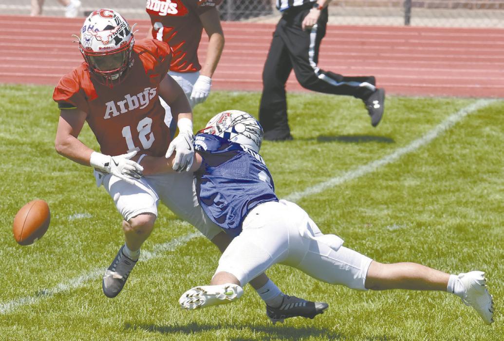 Kinney tackles Caden Buskirk of Chadron, who played on the West team. Photo Courtesy of Susan Hoover