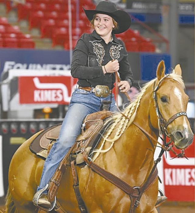 Kinsey Walz and her horse, Golden Firefighter, celebrate after performing well at Oklahoma’s Richest in Guthrie, Oklahoma.