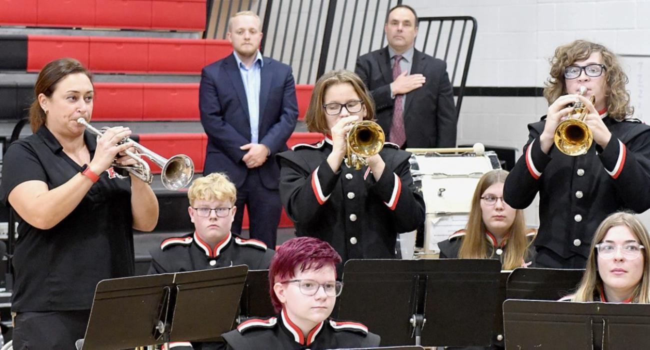 The AHS Band Trumpet Section played "Taps."