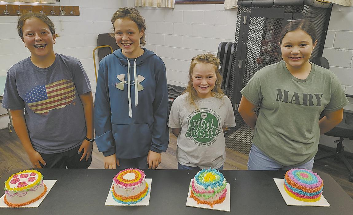 The BKR 4-H held a cake decorating workshop on June 18. Showing their finished products (left to right) are: Cassidy Swanson, Ashton Dearmont, Mattie Dearmont, and Adeline Hladky. Sarah Price (Simple Things by Sarah) was their teacher.