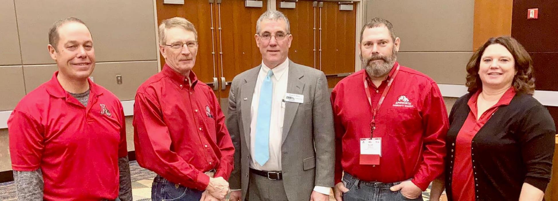 At the November 19th Annual Delegate Assembly at the 2021 State Education Conference of the Nebraska Association of School Boards (NASB), Ainsworth School Board member Brad Wilkins was passed the gavel to become the 2022 President of the NASB Board of Directors. Pictured above are Ainsworth School Board members at the Assembly: (Left to Right): Frank Beel, Mark Johnson, Brad Wilkins, Scott Erthum and Jessica Pozehl.