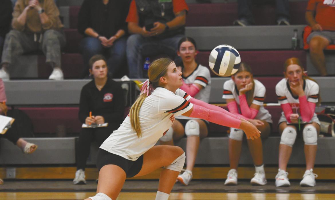 Senior Jaylee Good receives a serve during the team's game against Stuart.