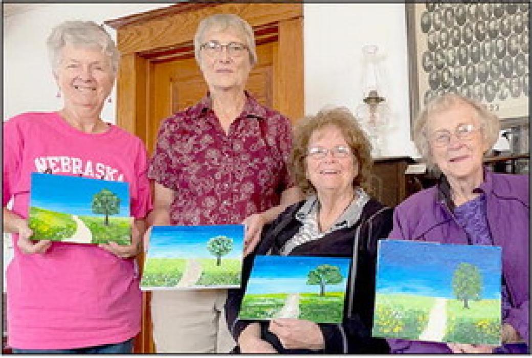 The September meeting activity included a lesson on acrylic painting using flat brushes, rat-tail combs, sponges and cotton swab sticks as well as artist brushes. Participating were (left to right) Lynn Robertson, Martha Rasmussen, Audrey Wilson and Carol Larson.