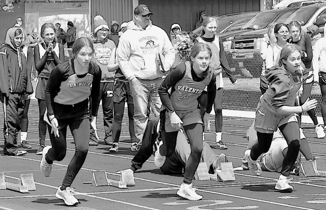 Jolyn Pozehl (left) ran the Middle School 100 Meter Dash at the Sandhills Invite held in Bassett on April 13th.