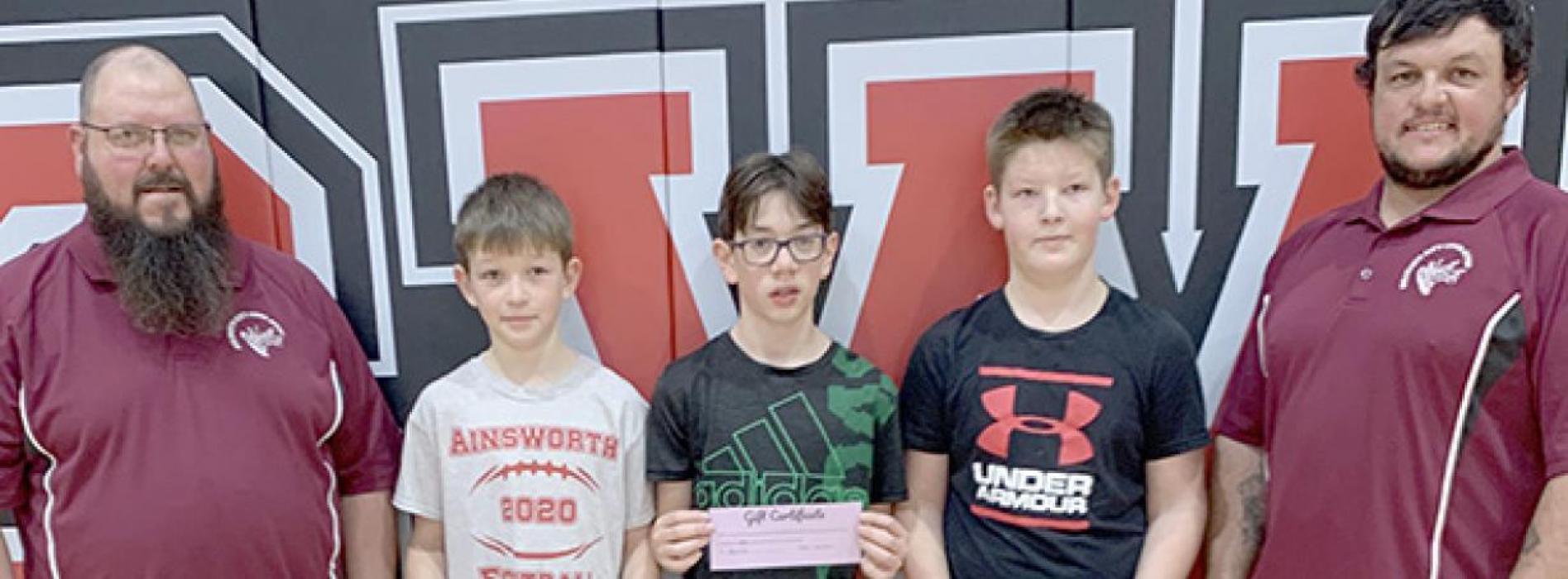 Jaxon Rucker (right) won the Boys 12-13 Year Old Division with Bear Rea (center) taking second place and Bateson Raymond (left) placing third.