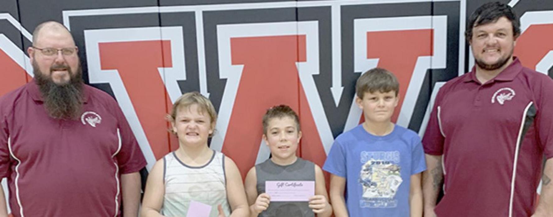 The Boys 10-11 Year Old Division was won by Andrew Johnson (left). Zaine Evans (right) took second place and Nathan Fernau (center) took third place.