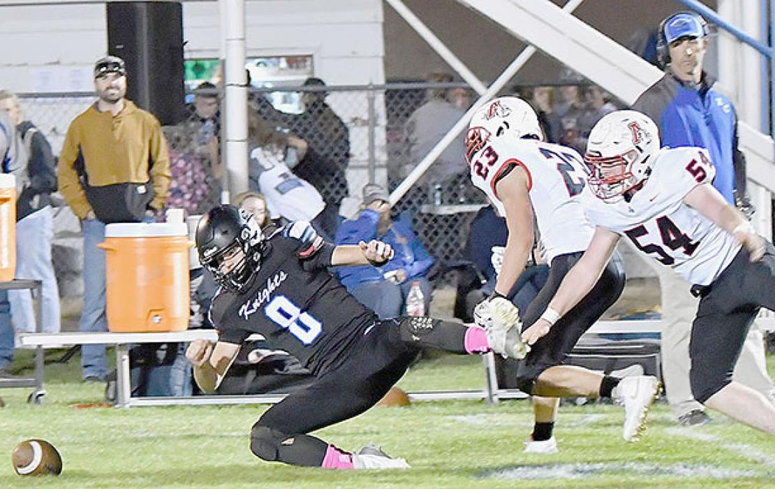 Cole Swanson, #23, and Witten Painter, #54, get to Fischer causing a fumble which Mason Painter scooped up and ran in for a Bulldog touchdown with 27 seconds left in the first quarter giving Ainsworth a 38-0 lead.