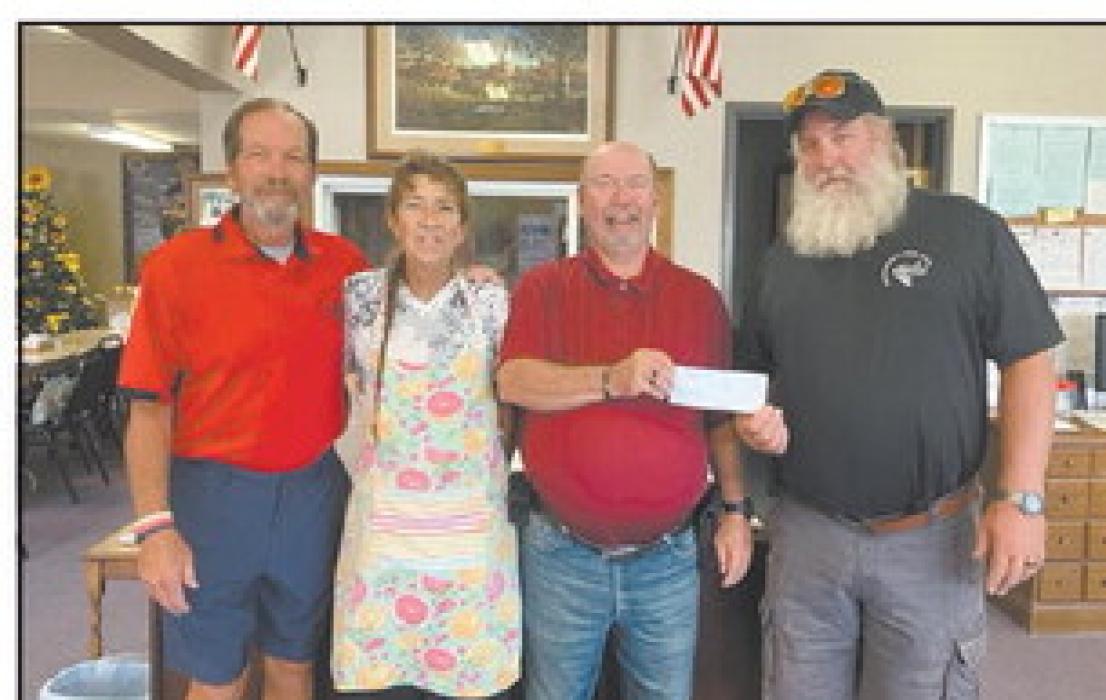 Ainsworth Elks Club memberrs present the check from the grant money to the Ainsworth Senior Center.