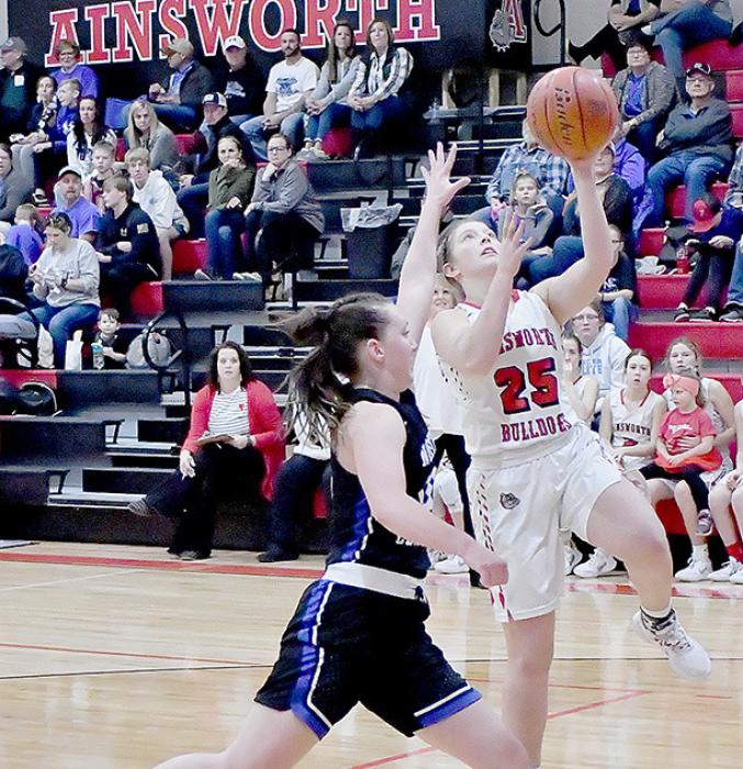 Saylen Young goes in for a lay up against the North Central Lady Knights. Ainsworth defeated the Lady Knights 38-28.